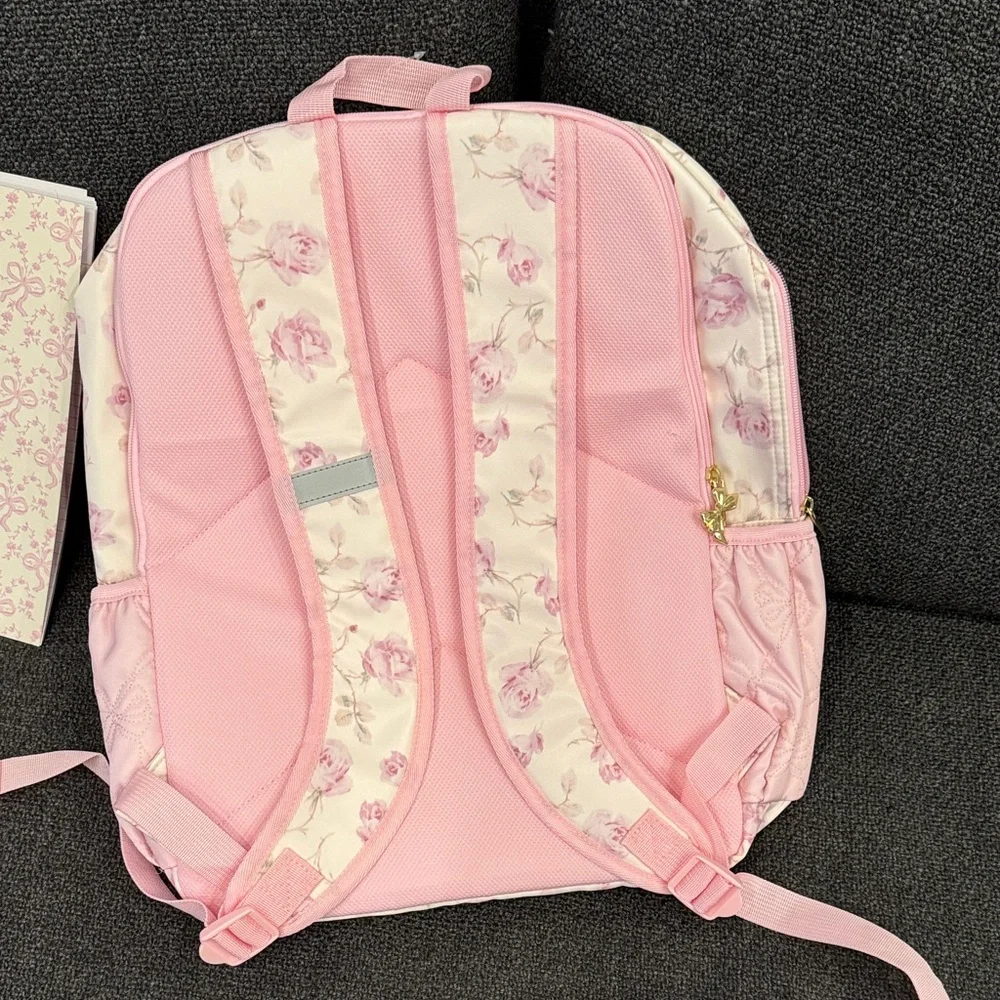 LoveShackFancy x Target Ribbon Rosa Backpack featuring a quilted front pocket
